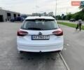 Білий Опель Інсігнія, об'ємом двигуна 1.96 л та пробігом 260 тис. км за 12699 $, фото 3 на Automoto.ua