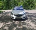 Белый Опель Инсигния, объемом двигателя 1.96 л и пробегом 217 тыс. км за 11500 $, фото 1 на Automoto.ua