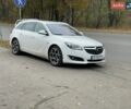 Білий Опель Інсігнія, об'ємом двигуна 1.96 л та пробігом 260 тис. км за 12699 $, фото 5 на Automoto.ua