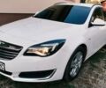 Белый Опель Инсигния, объемом двигателя 2 л и пробегом 261 тыс. км за 9450 $, фото 1 на Automoto.ua