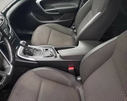 Білий Опель Інсігнія, об'ємом двигуна 2 л та пробігом 270 тис. км за 9850 $, фото 4 на Automoto.ua