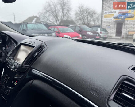 Білий Опель Інсігнія, об'ємом двигуна 2 л та пробігом 230 тис. км за 9600 $, фото 40 на Automoto.ua