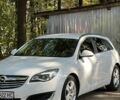 Білий Опель Інсігнія, об'ємом двигуна 2 л та пробігом 265 тис. км за 8200 $, фото 2 на Automoto.ua