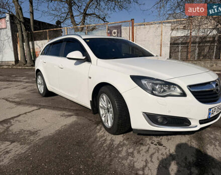 Білий Опель Інсігнія, об'ємом двигуна 2 л та пробігом 221 тис. км за 11600 $, фото 1 на Automoto.ua