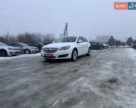 Білий Опель Інсігнія, об'ємом двигуна 2 л та пробігом 230 тис. км за 9600 $, фото 6 на Automoto.ua