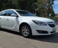Белый Опель Инсигния, объемом двигателя 1.96 л и пробегом 205 тыс. км за 8599 $, фото 3 на Automoto.ua