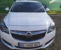 Білий Опель Інсігнія, об'ємом двигуна 1.6 л та пробігом 239 тис. км за 11300 $, фото 1 на Automoto.ua