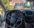 Білий Опель Інсігнія, об'ємом двигуна 1.96 л та пробігом 230 тис. км за 10500 $, фото 10 на Automoto.ua