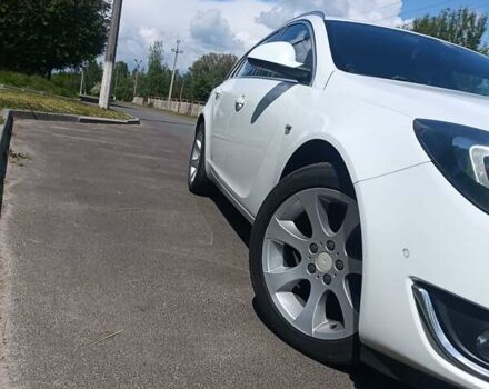 Белый Опель Инсигния, объемом двигателя 1.6 л и пробегом 170 тыс. км за 9900 $, фото 2 на Automoto.ua