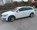 Білий Опель Інсігнія, об'ємом двигуна 1.96 л та пробігом 300 тис. км за 12999 $, фото 16 на Automoto.ua