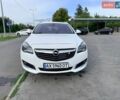 Білий Опель Інсігнія, об'ємом двигуна 1.96 л та пробігом 260 тис. км за 12699 $, фото 1 на Automoto.ua