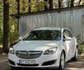 Білий Опель Інсігнія, об'ємом двигуна 2 л та пробігом 265 тис. км за 8200 $, фото 1 на Automoto.ua