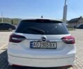 Білий Опель Інсігнія, об'ємом двигуна 2 л та пробігом 293 тис. км за 11500 $, фото 4 на Automoto.ua