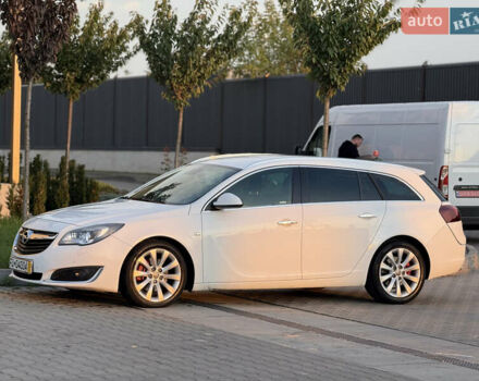 Белый Опель Инсигния, объемом двигателя 2 л и пробегом 340 тыс. км за 9600 $, фото 4 на Automoto.ua