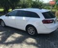 Білий Опель Інсігнія, об'ємом двигуна 1.6 л та пробігом 220 тис. км за 9900 $, фото 11 на Automoto.ua