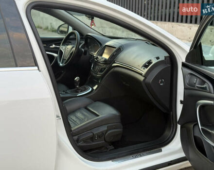 Белый Опель Инсигния, объемом двигателя 2 л и пробегом 340 тыс. км за 9600 $, фото 18 на Automoto.ua