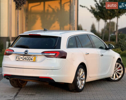 Белый Опель Инсигния, объемом двигателя 2 л и пробегом 340 тыс. км за 9600 $, фото 2 на Automoto.ua