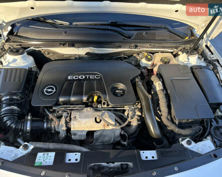 Білий Опель Інсігнія, об'ємом двигуна 1.6 л та пробігом 235 тис. км за 11550 $, фото 7 на Automoto.ua