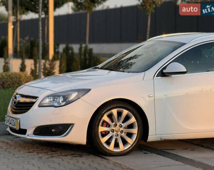 Белый Опель Инсигния, объемом двигателя 2 л и пробегом 340 тыс. км за 9600 $, фото 6 на Automoto.ua