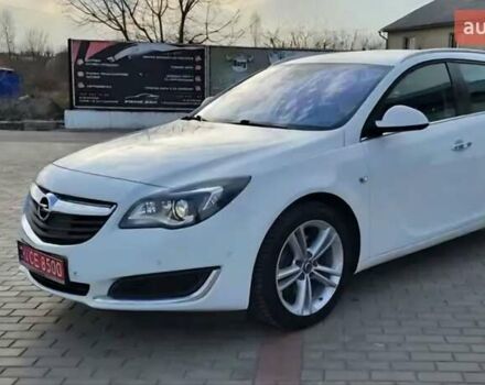 Білий Опель Інсігнія, об'ємом двигуна 1.96 л та пробігом 252 тис. км за 14200 $, фото 4 на Automoto.ua