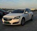 Белый Опель Инсигния, объемом двигателя 2 л и пробегом 256 тыс. км за 12990 $, фото 1 на Automoto.ua