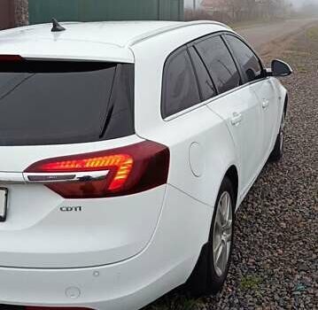 Білий Опель Інсігнія, об'ємом двигуна 1.6 л та пробігом 227 тис. км за 9500 $, фото 2 на Automoto.ua