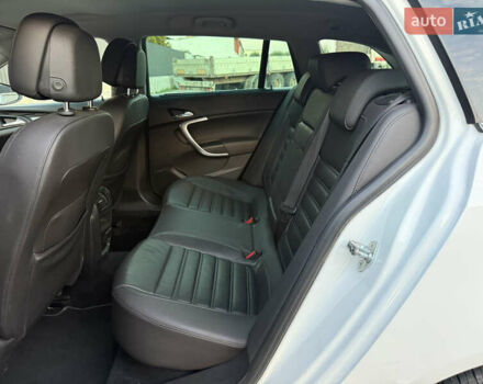 Белый Опель Инсигния, объемом двигателя 2 л и пробегом 340 тыс. км за 9600 $, фото 11 на Automoto.ua