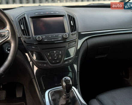 Белый Опель Инсигния, объемом двигателя 2 л и пробегом 340 тыс. км за 9600 $, фото 12 на Automoto.ua