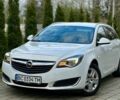 Белый Опель Инсигния, объемом двигателя 1.6 л и пробегом 290 тыс. км за 8250 $, фото 4 на Automoto.ua