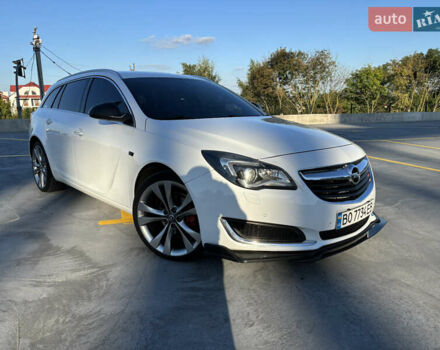 Білий Опель Інсігнія, об'ємом двигуна 1.6 л та пробігом 235 тис. км за 11550 $, фото 1 на Automoto.ua