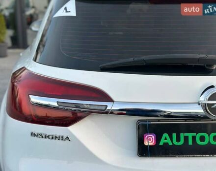 Белый Опель Инсигния, объемом двигателя 1.96 л и пробегом 256 тыс. км за 12500 $, фото 6 на Automoto.ua
