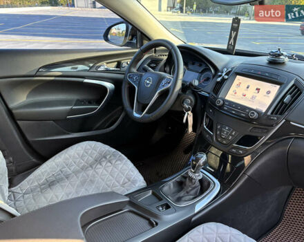 Білий Опель Інсігнія, об'ємом двигуна 1.6 л та пробігом 235 тис. км за 11550 $, фото 5 на Automoto.ua