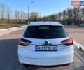 Белый Опель Инсигния, объемом двигателя 1.96 л и пробегом 258 тыс. км за 9600 $, фото 3 на Automoto.ua