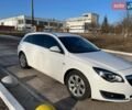 Білий Опель Інсігнія, об'ємом двигуна 1.96 л та пробігом 258 тис. км за 9600 $, фото 1 на Automoto.ua