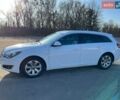 Белый Опель Инсигния, объемом двигателя 1.96 л и пробегом 258 тыс. км за 9600 $, фото 2 на Automoto.ua