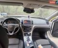 Білий Опель Інсігнія, об'ємом двигуна 1.6 л та пробігом 275 тис. км за 9999 $, фото 5 на Automoto.ua