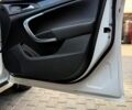 Білий Опель Інсігнія, об'ємом двигуна 1.6 л та пробігом 212 тис. км за 10800 $, фото 24 на Automoto.ua