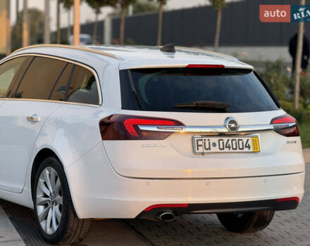 Белый Опель Инсигния, объемом двигателя 2 л и пробегом 340 тыс. км за 9600 $, фото 5 на Automoto.ua