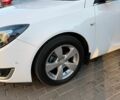 Білий Опель Інсігнія, об'ємом двигуна 1.6 л та пробігом 212 тис. км за 10800 $, фото 4 на Automoto.ua