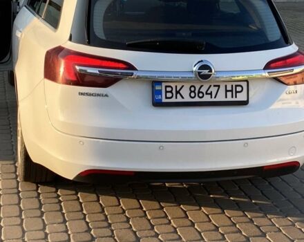 Білий Опель Інсігнія, об'ємом двигуна 1.6 л та пробігом 208 тис. км за 8600 $, фото 4 на Automoto.ua