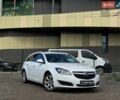 Білий Опель Інсігнія, об'ємом двигуна 1.96 л та пробігом 199 тис. км за 13490 $, фото 1 на Automoto.ua