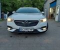 Білий Опель Інсігнія, об'ємом двигуна 2 л та пробігом 233 тис. км за 13500 $, фото 1 на Automoto.ua