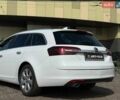Білий Опель Інсігнія, об'ємом двигуна 1.96 л та пробігом 199 тис. км за 13490 $, фото 5 на Automoto.ua