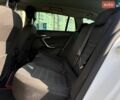 Білий Опель Інсігнія, об'ємом двигуна 1.96 л та пробігом 199 тис. км за 13490 $, фото 9 на Automoto.ua