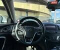 Білий Опель Інсігнія, об'ємом двигуна 1.96 л та пробігом 199 тис. км за 13490 $, фото 14 на Automoto.ua