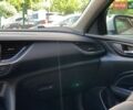 Білий Опель Інсігнія, об'ємом двигуна 2 л та пробігом 261 тис. км за 13299 $, фото 58 на Automoto.ua