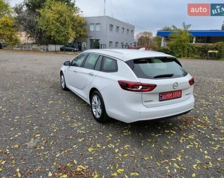 Білий Опель Інсігнія, об'ємом двигуна 2 л та пробігом 245 тис. км за 15700 $, фото 2 на Automoto.ua