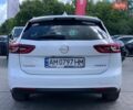 Білий Опель Інсігнія, об'ємом двигуна 2 л та пробігом 261 тис. км за 13299 $, фото 16 на Automoto.ua
