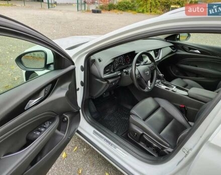 Білий Опель Інсігнія, об'ємом двигуна 2 л та пробігом 245 тис. км за 15700 $, фото 8 на Automoto.ua