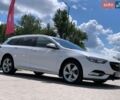 Білий Опель Інсігнія, об'ємом двигуна 2 л та пробігом 261 тис. км за 13299 $, фото 5 на Automoto.ua